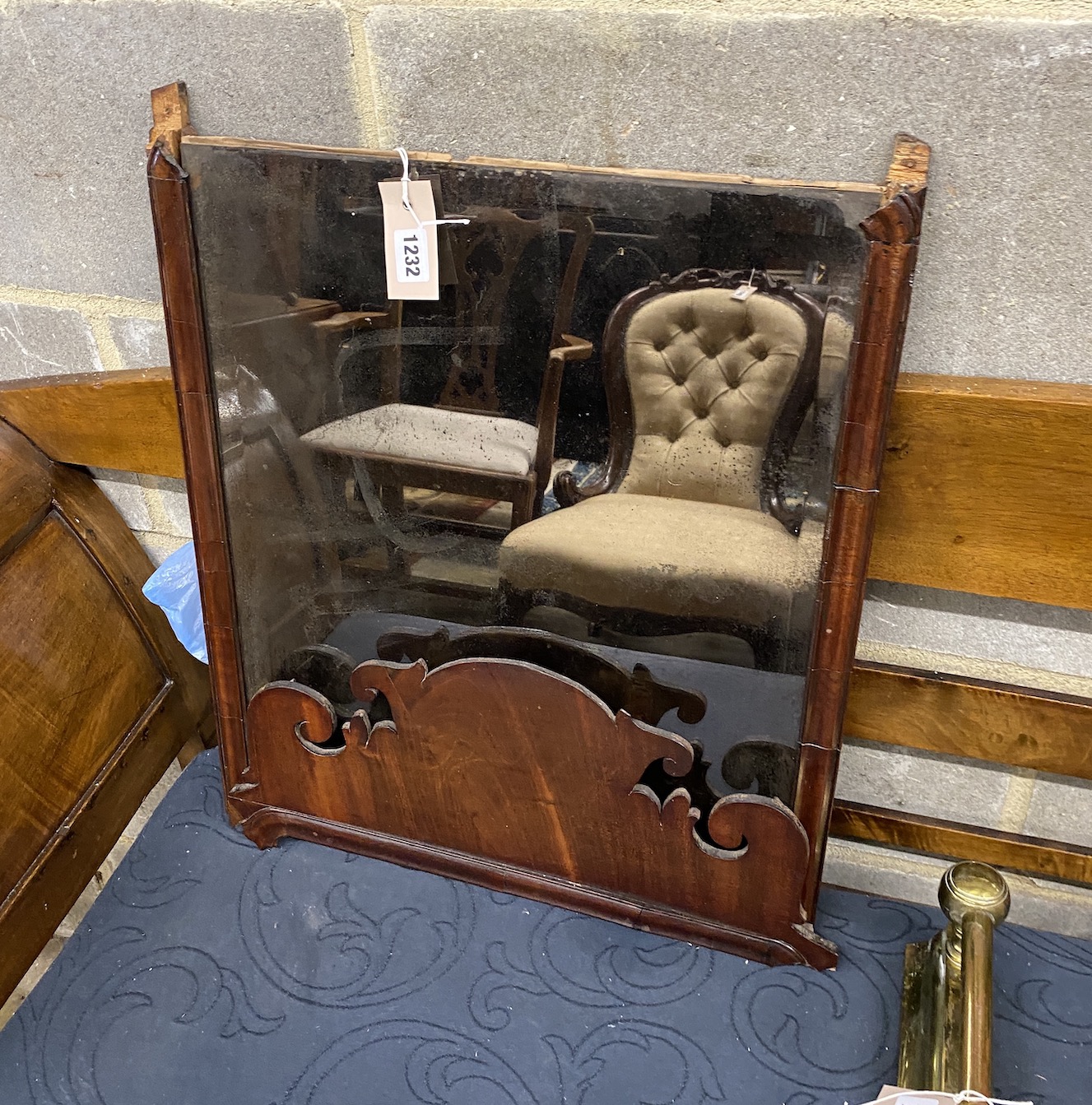 An 18th century style walnut fret cut wall mirror, width 46cm, (damaged)